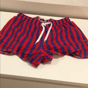 Blue and red striped beach shorts
